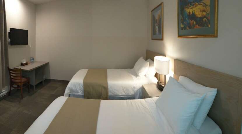 Imagen de la habitación del Hotel Le Deville. Foto 9