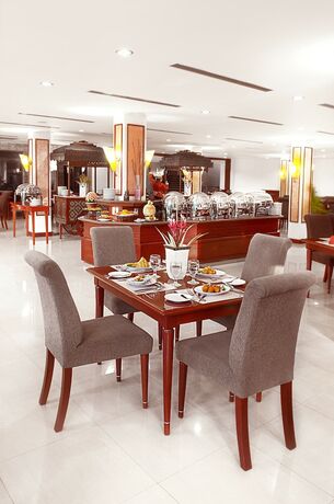 Imagen del bar/restaurante del Hotel Le Dian And Cottages. Foto 6