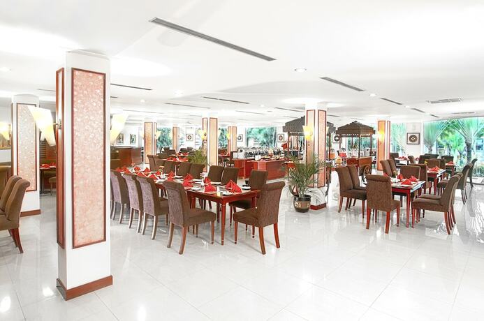 Imagen del bar/restaurante del Hotel Le Dian And Cottages. Foto 7