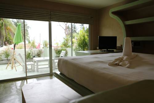 Imagen de la habitación del Hotel Le Divine Comedie Beach Resort. Foto 4