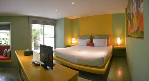 Imagen de la habitación del Hotel Le Divine Comedie Beach Resort. Foto 7