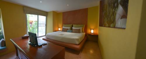 Imagen de la habitación del Hotel Le Divine Comedie Beach Resort. Foto 8