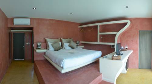 Imagen de la habitación del Hotel Le Divine Comedie Beach Resort. Foto 9