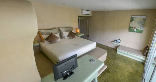 Imagen de la habitación del Hotel Le Divine Comedie Beach Resort. Foto 10