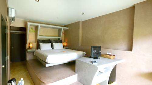 Imagen de la habitación del Hotel Le Divine Comedie Beach Resort. Foto 13