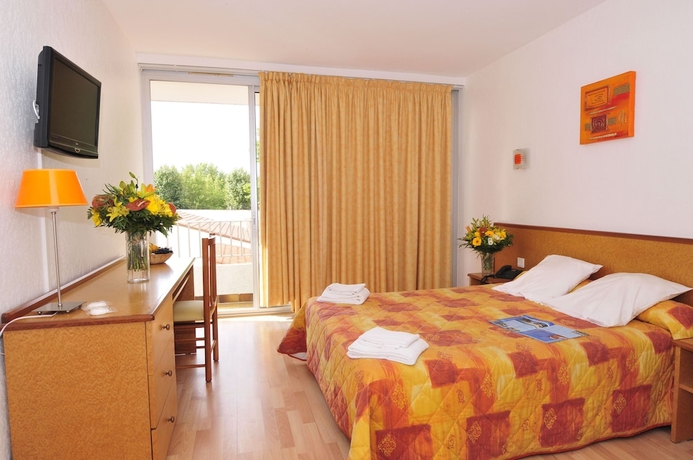 Imagen de la habitación del Hotel Le Domaine Du Mas Blanc By Popinns. Foto 5