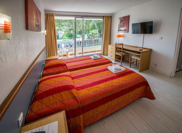 Imagen de la habitación del Hotel Le Domaine Du Mas Blanc By Popinns. Foto 8