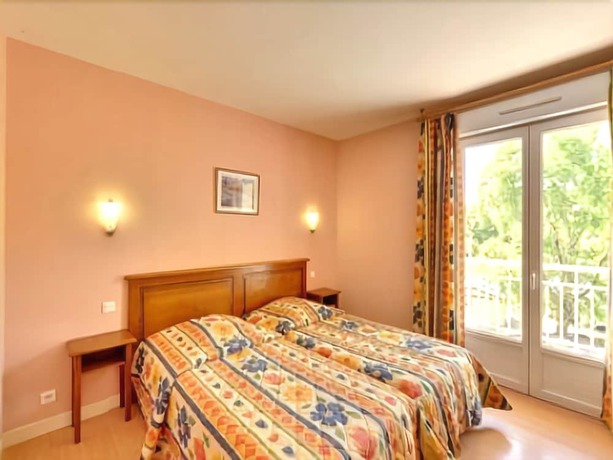 Imagen de la habitación del Hotel Le Domaine de Renaudet. Foto 9