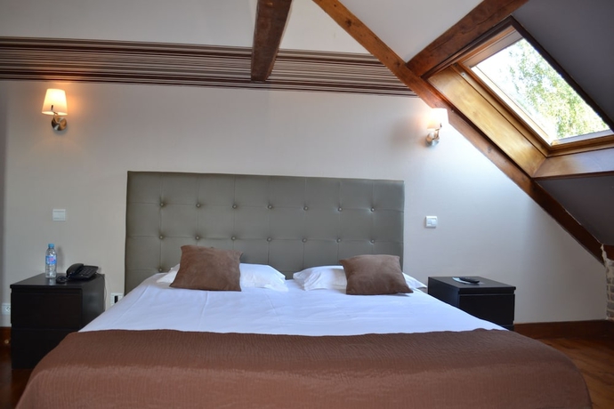 Imagen de la habitación del Hotel Le Domaine des Cigognes. Foto 16