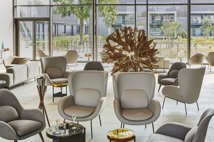 Imagen del bar/restaurante del Hotel Le Domaine des Vanneaux Golf and Spa MGallery. Foto 2