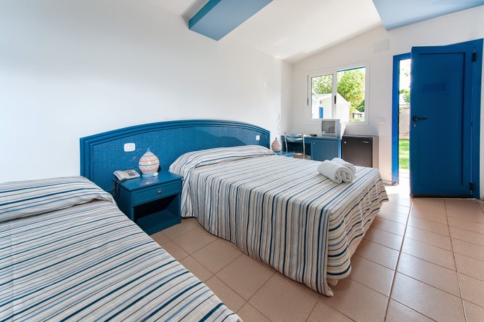 Imagen de la habitación del Hotel Le Dune Beach Club. Foto 4