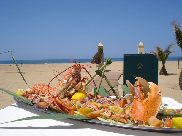 Imagen del bar/restaurante del Hotel Le Dune Piscinas. Foto 4