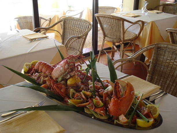 Imagen del bar/restaurante del Hotel Le Dune Piscinas. Foto 6