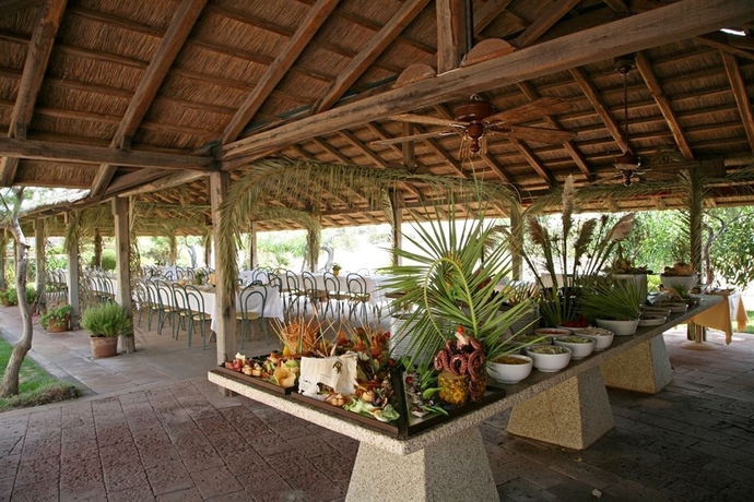 Imagen del bar/restaurante del Hotel Le Dune Piscinas. Foto 7