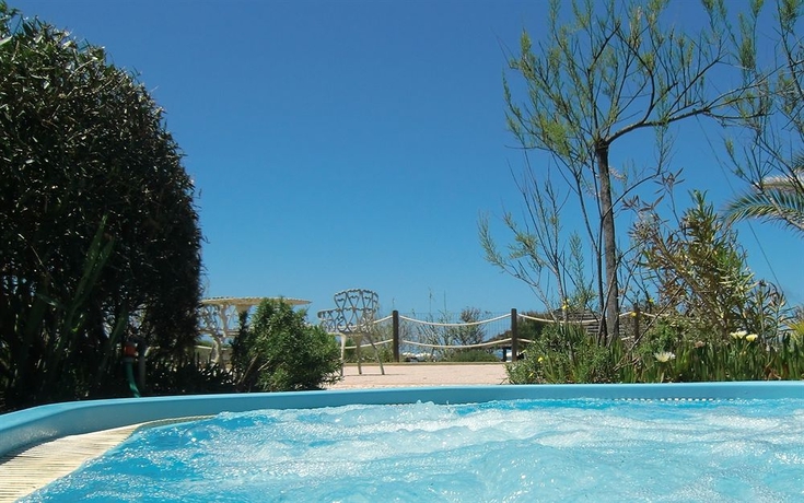 Imagen de los exteriores del Hotel Le Dune Piscinas. Foto 11