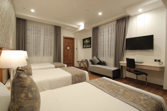 Imagen de la habitación del Hotel Le Duy Grand. Foto 3