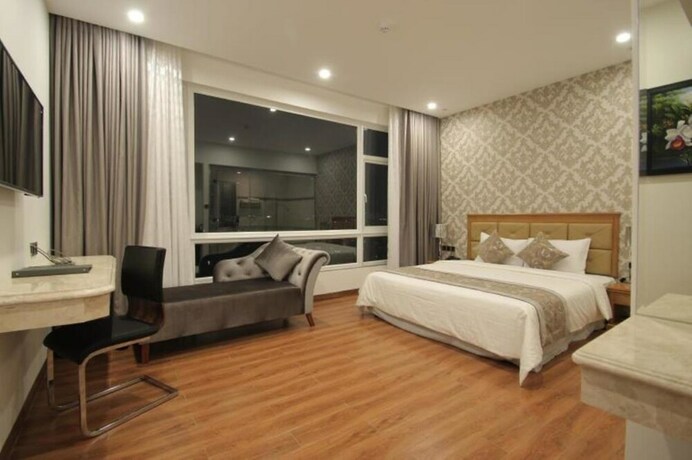 Imagen de la habitación del Hotel Le Duy Grand. Foto 7