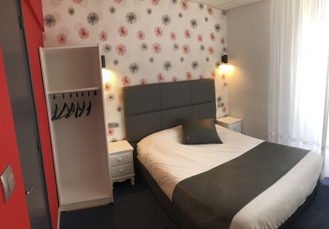 Imagen de la habitación del Hotel Le Faisan, MONTLUCON. Foto 5