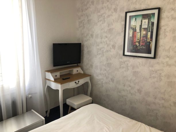 Imagen de la habitación del Hotel Le Faisan, MONTLUCON. Foto 11