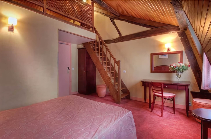 Imagen de la habitación del Hotel Le Faubourg. Foto 8