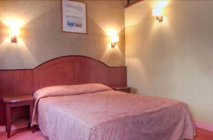 Imagen de la habitación del Hotel Le Faubourg. Foto 11