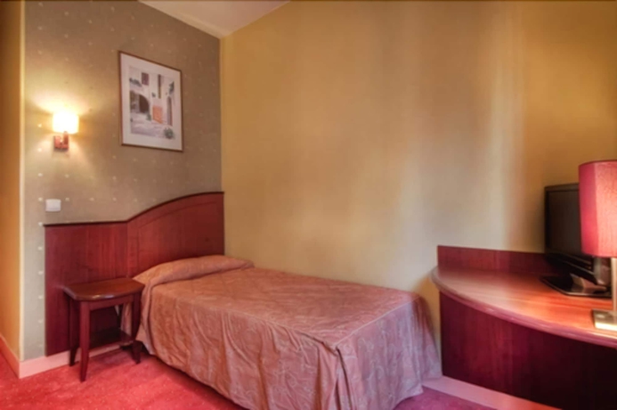 Imagen de la habitación del Hotel Le Faubourg. Foto 12