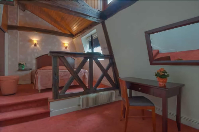 Imagen de la habitación del Hotel Le Faubourg. Foto 13