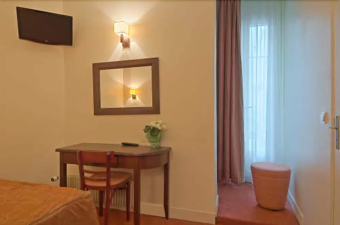 Imagen de la habitación del Hotel Le Faubourg. Foto 14