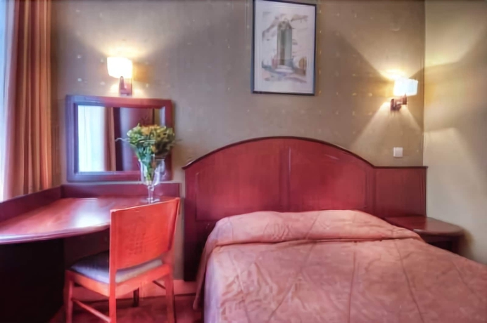 Imagen de la habitación del Hotel Le Faubourg. Foto 16