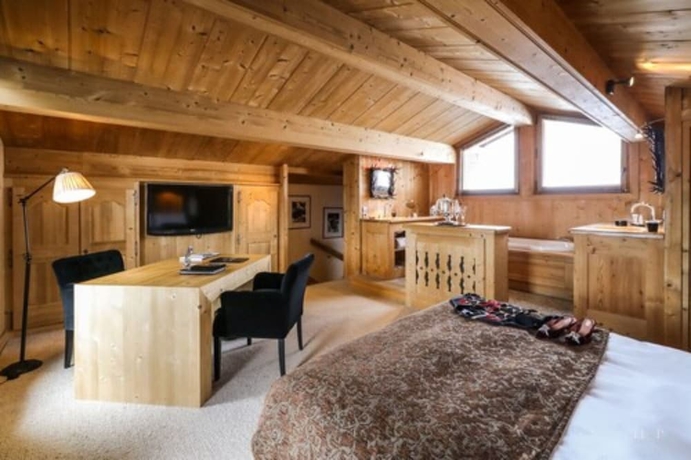 Imagen de la habitación del Hotel Le Fer à Cheval, Megeve. Foto 7