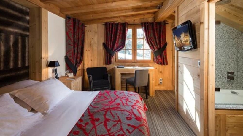 Imagen de la habitación del Hotel Le Fer à Cheval, Megeve. Foto 12