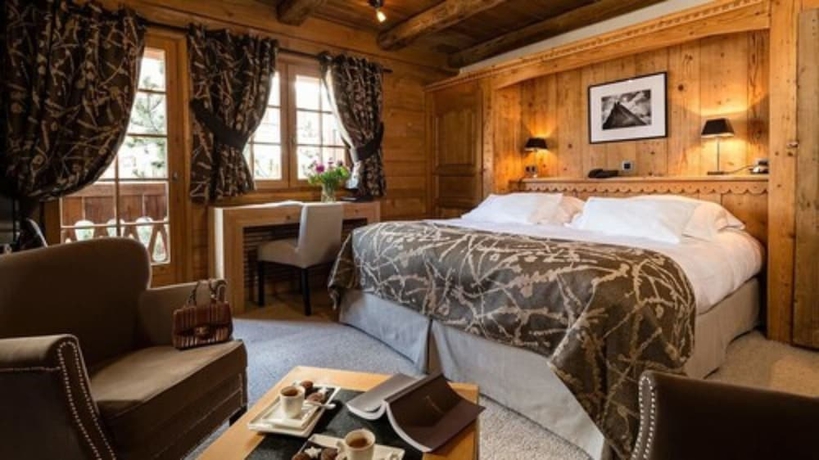 Imagen de la habitación del Hotel Le Fer à Cheval, Megeve. Foto 14