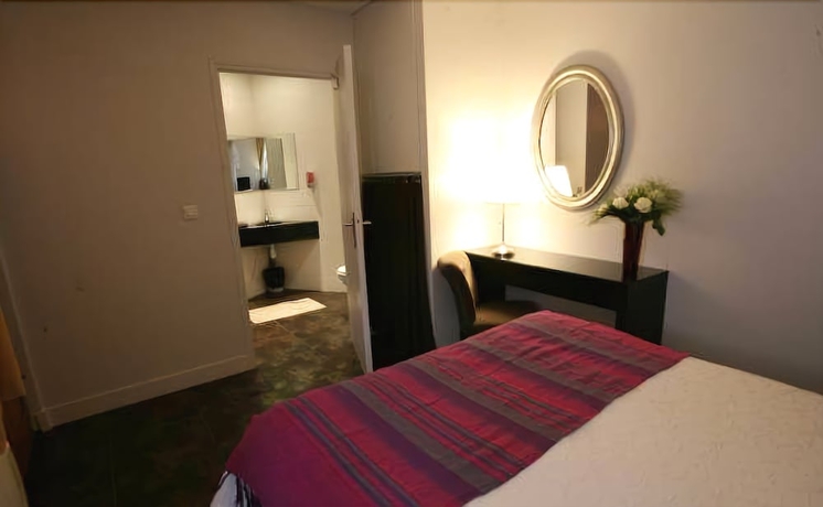 Imagen de la habitación del Hotel Le Figuier. Foto 7