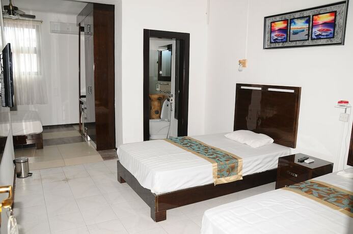 Imagen de la habitación del Hotel Le Flamboyant. Foto 9