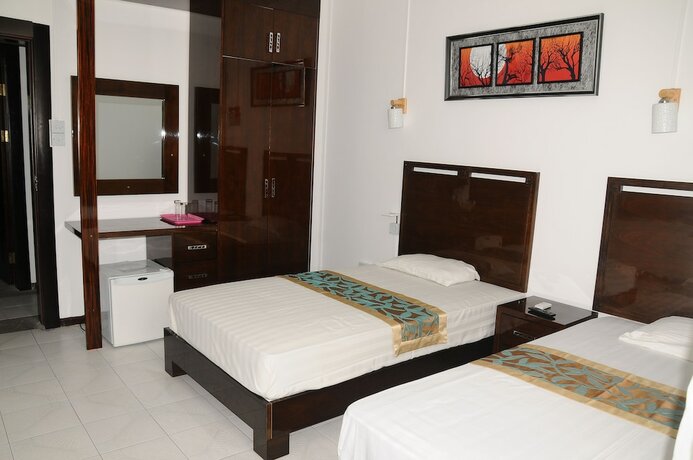 Imagen de la habitación del Hotel Le Flamboyant. Foto 11