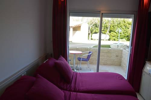 Imagen de la habitación del Hotel Le Fleurance. Foto 14