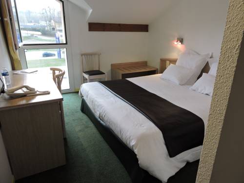 Imagen de la habitación del Hotel Le Foron. Foto 16