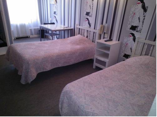 Imagen de la habitación del Hotel Le Franco Belge. Foto 11