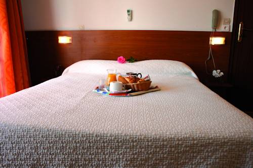 Imagen de la habitación del Hotel Le Gabian. Foto 10