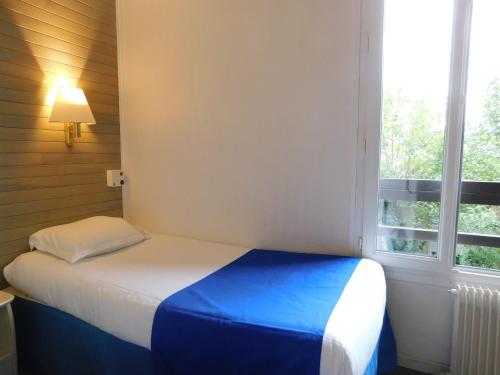 Imagen de la habitación del Hotel Le Gambetta, Bergerac. Foto 8