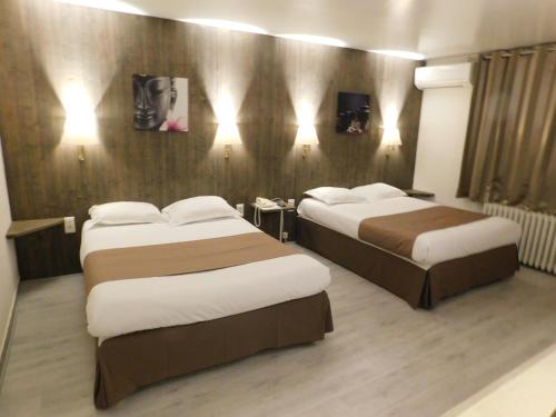 Imagen de la habitación del Hotel Le Gambetta, Bergerac. Foto 9