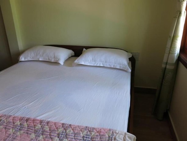 Imagen de la habitación del Hotel Le Garden Villa Homestay. Foto 3