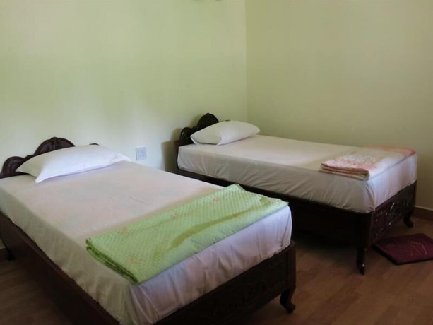 Imagen de la habitación del Hotel Le Garden Villa Homestay. Foto 8