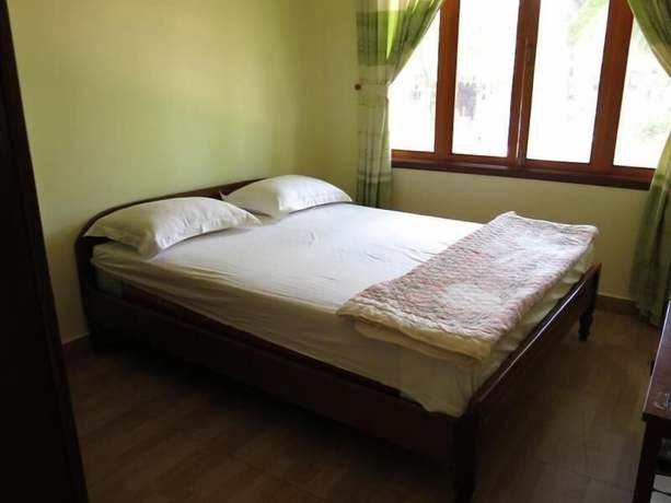 Imagen de la habitación del Hotel Le Garden Villa Homestay. Foto 15