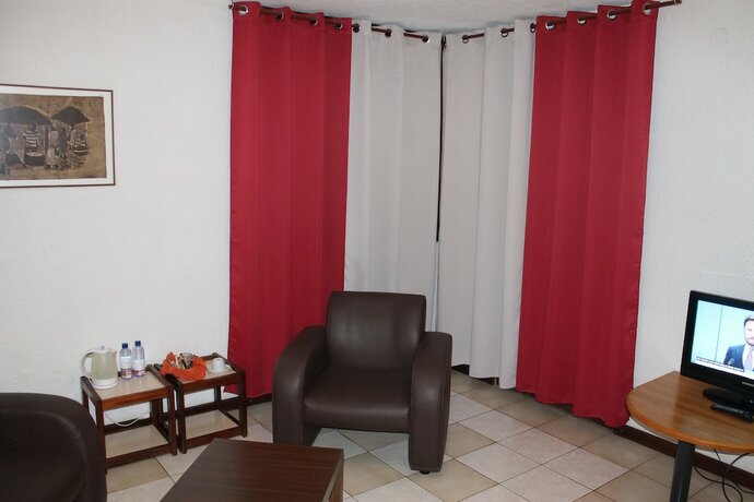 Imagen de la habitación del Hotel Le Garni Kigali. Foto 18