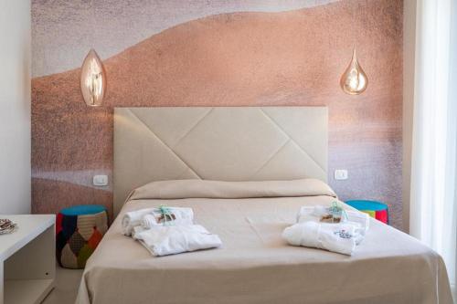 Imagen de la habitación del Hotel Le Gemelle Boutique. Foto 16
