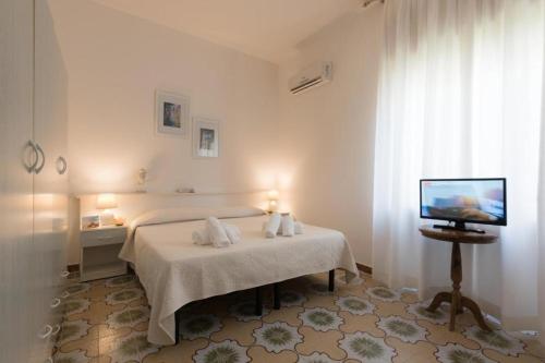 Imagen de la habitación del Hotel Le Gemelle Boutique. Foto 17