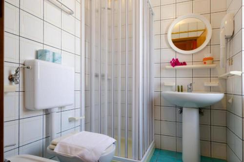 Imagen de la habitación del Hotel Le Gemelle Boutique. Foto 19
