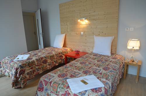 Imagen de la habitación del Hotel Le Genève. Foto 5