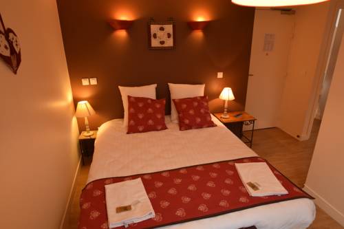 Imagen de la habitación del Hotel Le Genève. Foto 8